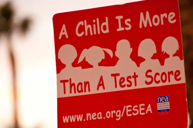 Teachers gather in front of the Clark County School District Education Center on East Flamingo Road on Thursday, Jan. 26, 2012, to speak out against the School Board, which was holding a meeting inside.